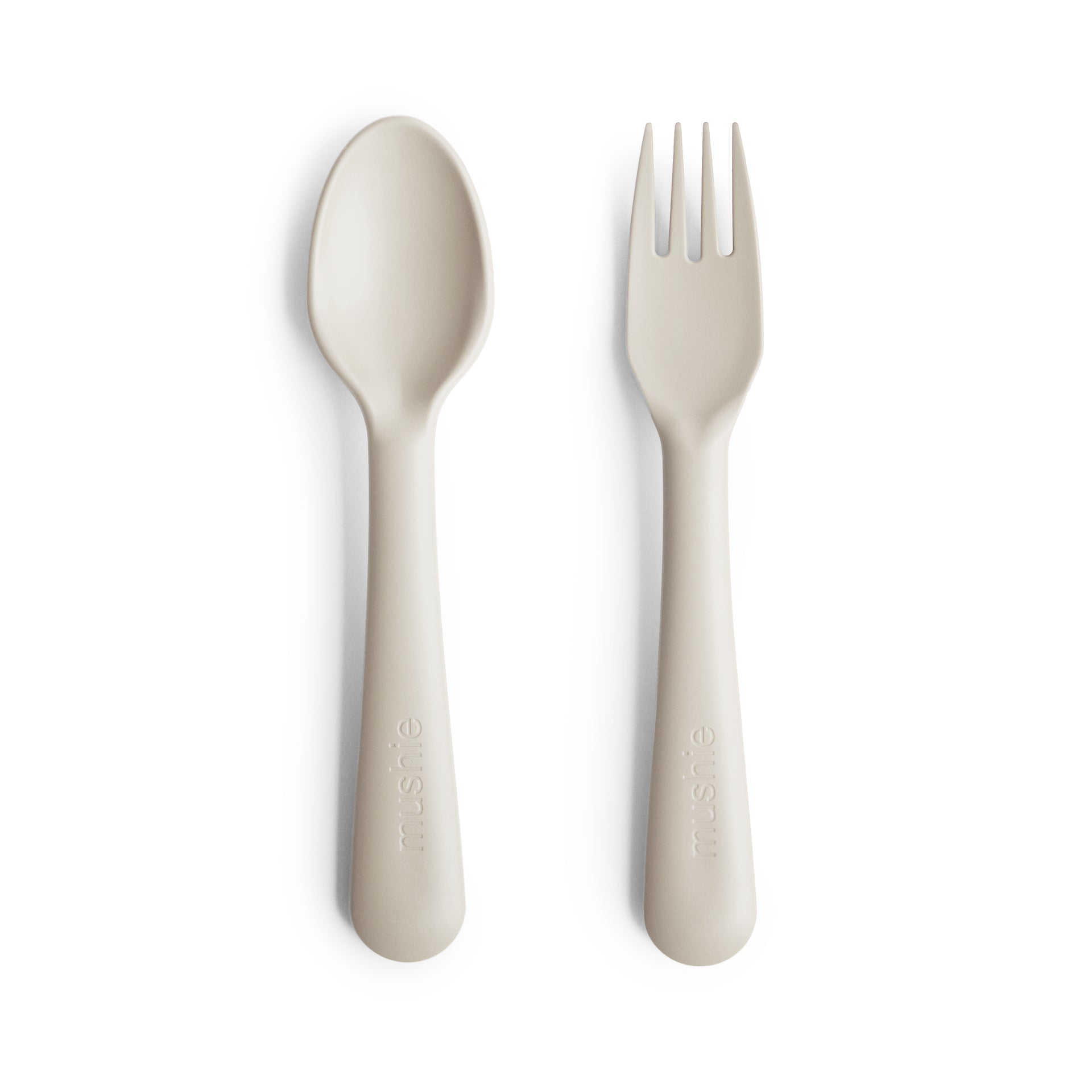 Mushie bestek vork en lepel (fork and spoon) in kleur Ivory, gemaakt uit siliconen van het merk Mushie